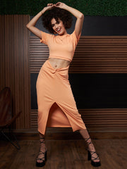 athena peach coloured round neck short sleeves cut outs sheath midi dress