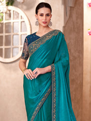 ساري نسائي من قماش الجورجيت بلون أخضر مخضر مزين بتطريزات، مع قطعة بلوزة.