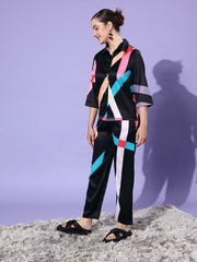 طقم ملابس نسائية من الساتان باللونين الأسود والبيج من ستايلستون