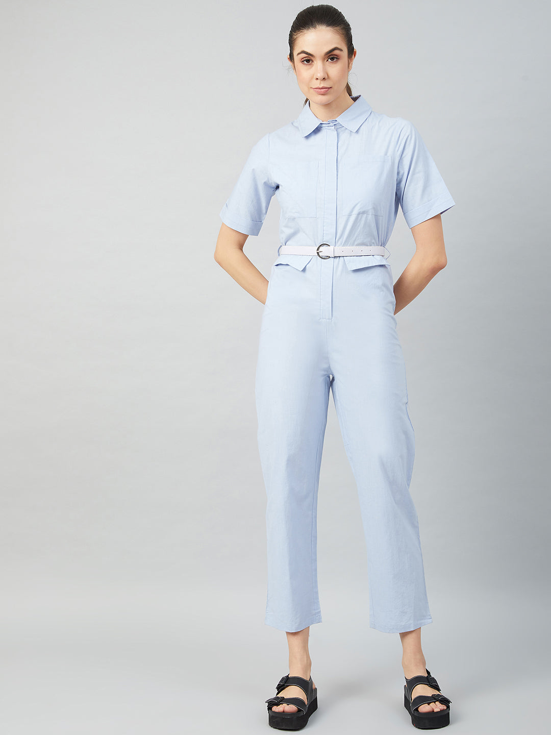 athena blue cotton jumpsuit front zip and pockets detail