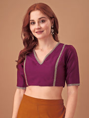 Magenta colored half sleeves tafeta blouse with lace embellishments
