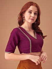 Magenta colored half sleeves tafeta blouse with lace embellishments