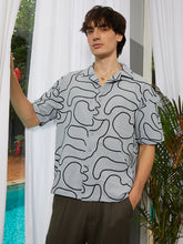 قميص واسع مبطن بنقش تجريدي