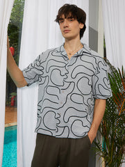 قميص واسع مبطن بنقش تجريدي