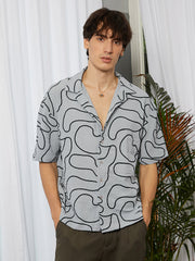 قميص واسع مبطن بنقش تجريدي