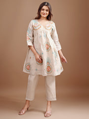 Beige colour linen multi thread embroidery flared tunic with trouser coord set