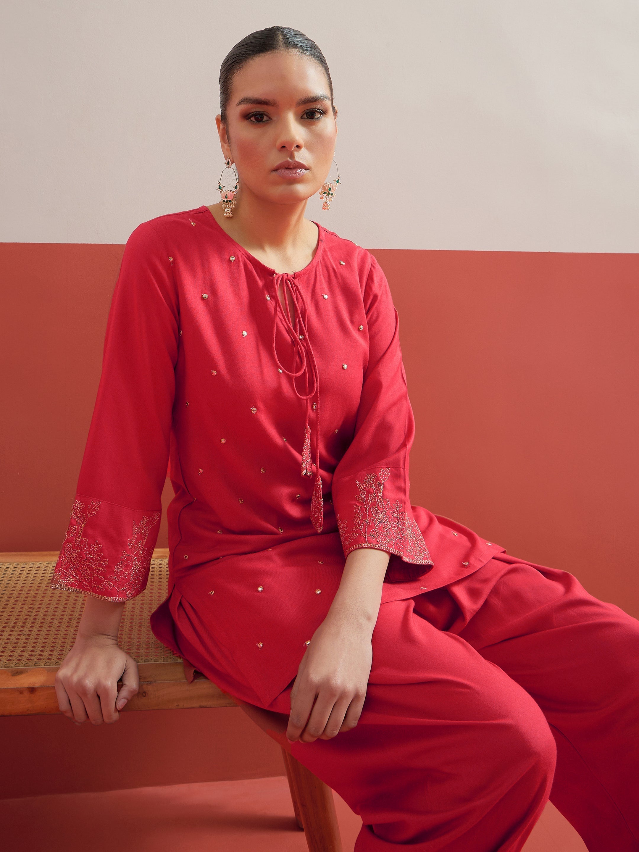 Red All Over Embroidered Short Kurti With Pharsi Salwar Shae by SASSAFRAS