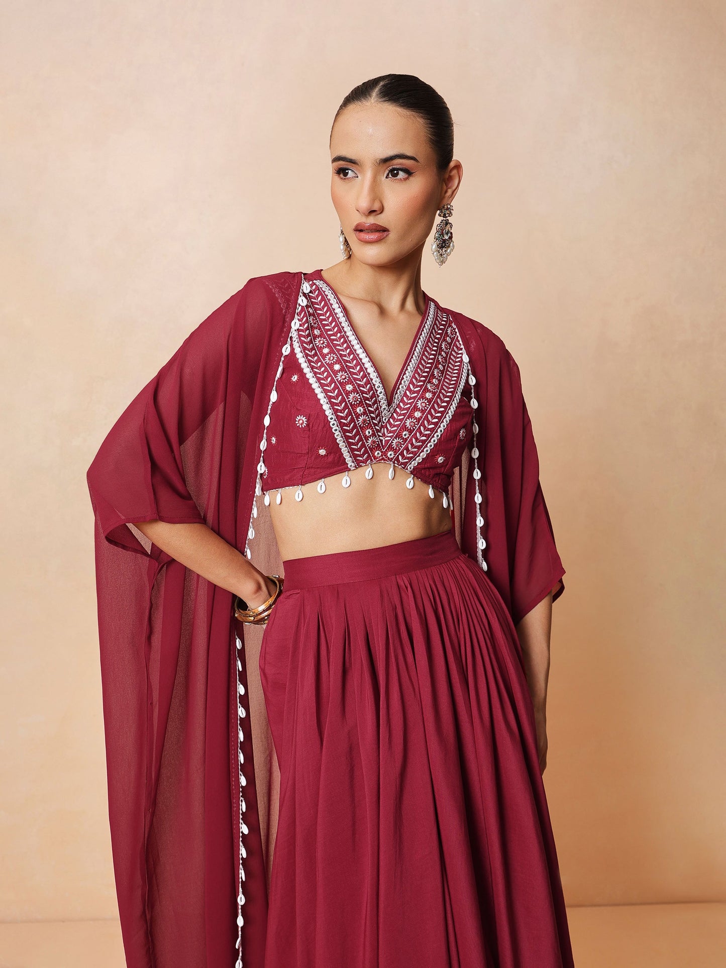 Maroon Embroidered Crop Top With Dhoti Skirt And Shrug-Shae by SASSAFRAS
