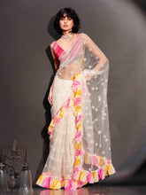 Tikhi Imli - Off white colored net saree with faux mirror embroidery and printed lehariya frill on border