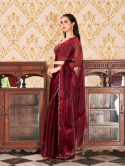 Tikhi Imli - Maroon colored satin chiffon saree with embroiderd blouse and scalloped border
