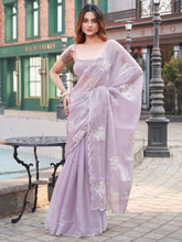 Lavendar colored burbery satin saree with sequinned embroidered butta on pallu and scalloped border