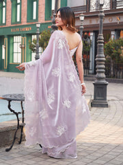 Lavendar colored burbery satin saree with sequinned embroidered butta on pallu and scalloped border