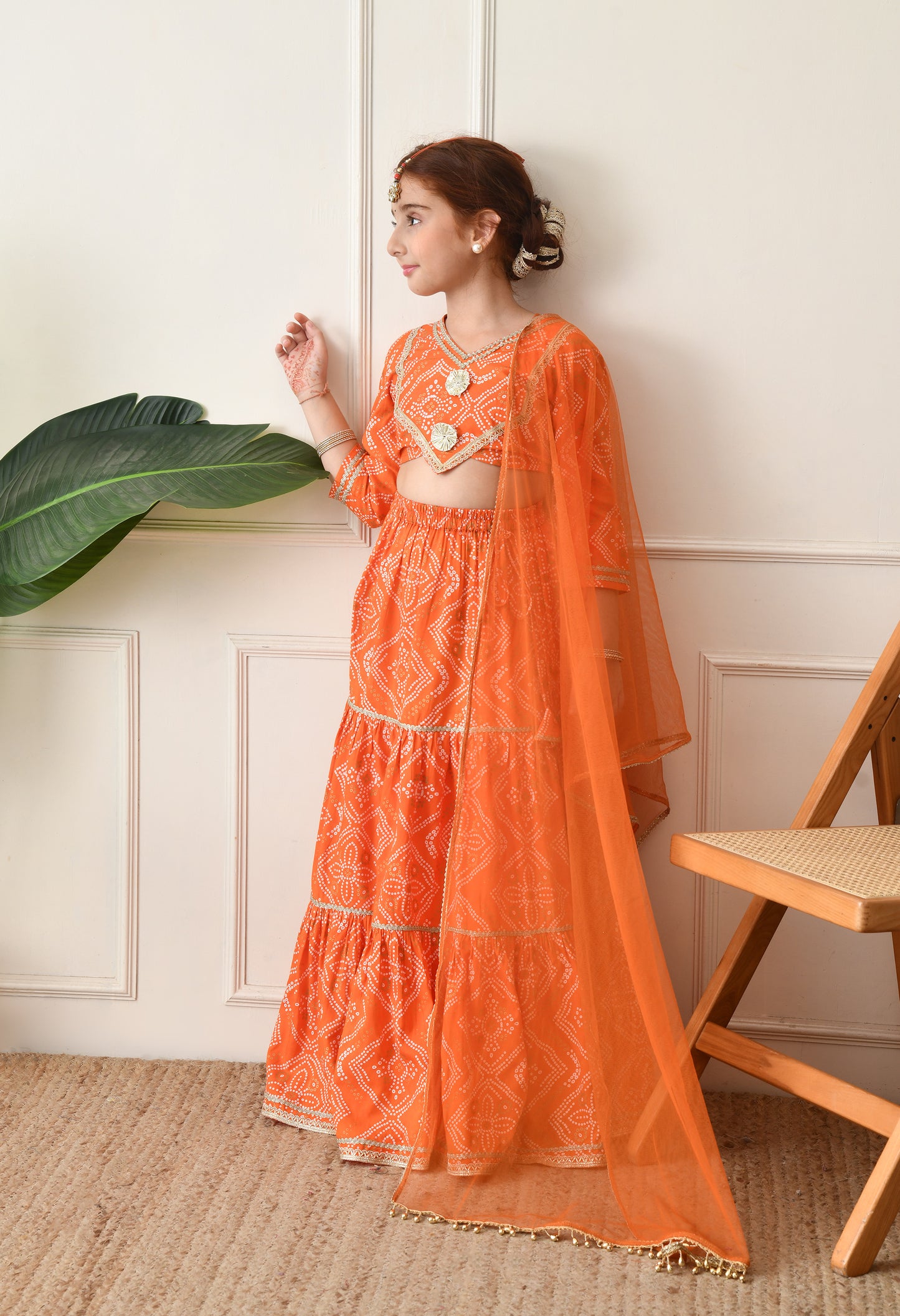 Girls Bright Orange Bandhani Printed Lehenga Choli Set with Net Dupatta