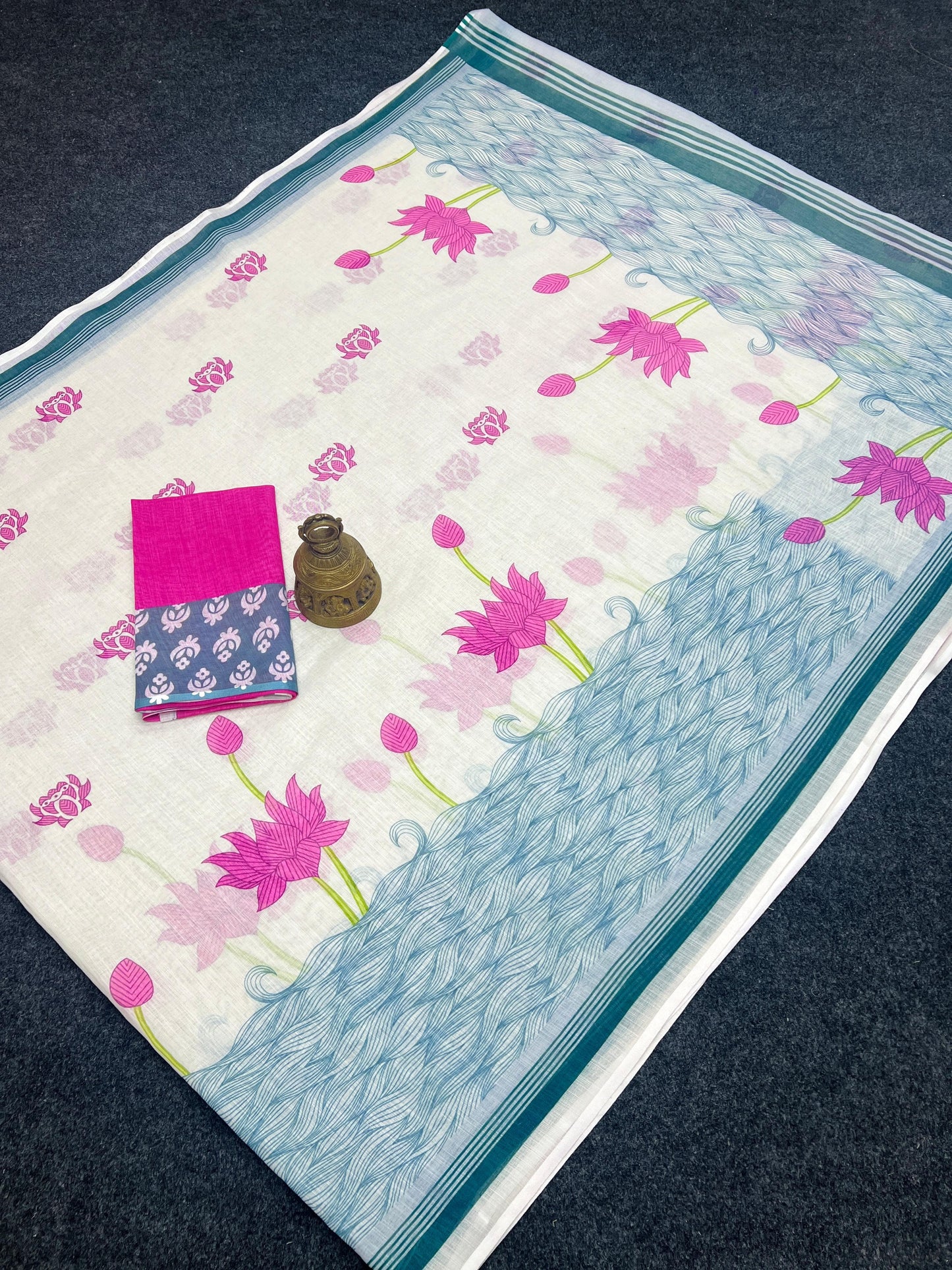Soft linen saree with shaded style prints.