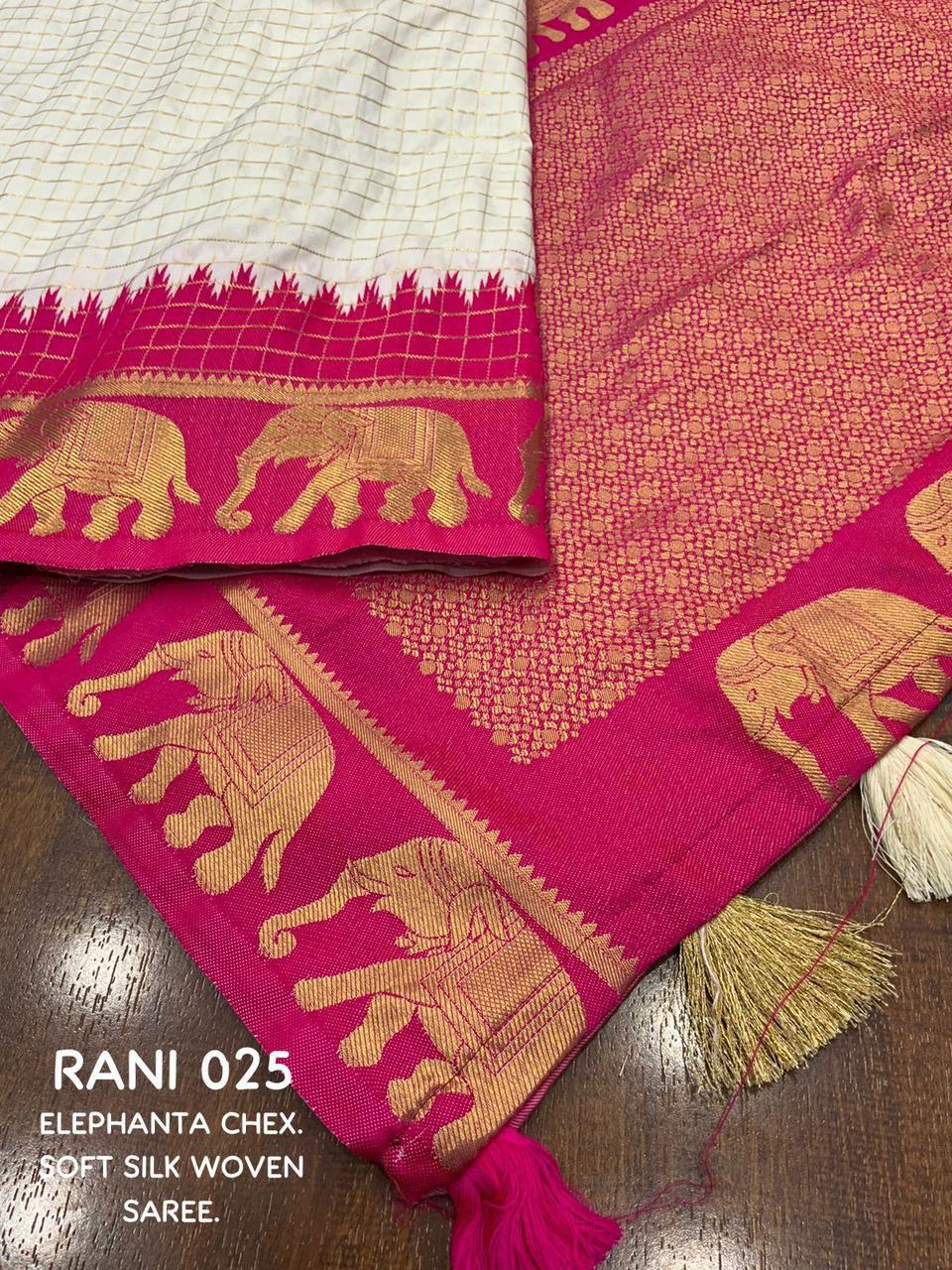 sift silk saree with zari woven chex and with elephant border and rich pallu.Cotton tasslels on pallu.
