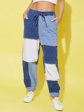 بنطال رياضي نسائي أزرق من قماش الدنيم المرقع