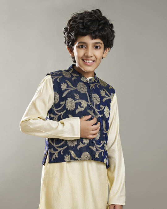 Boys off white kurta pajama with a blue jacquard jacket