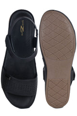 صندل أنيق وعصري بكعب دائري وحلقة للكاحل، بارتفاع بوصة واحدة، ونعل مسطح.