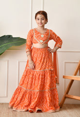Girls Bright Orange Bandhani Printed Lehenga Choli Set with Net Dupatta