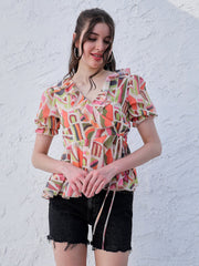 athena orange abstract printed puff sleeve ruffles georgette wrap top