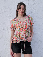 athena orange abstract printed puff sleeve ruffles georgette wrap top