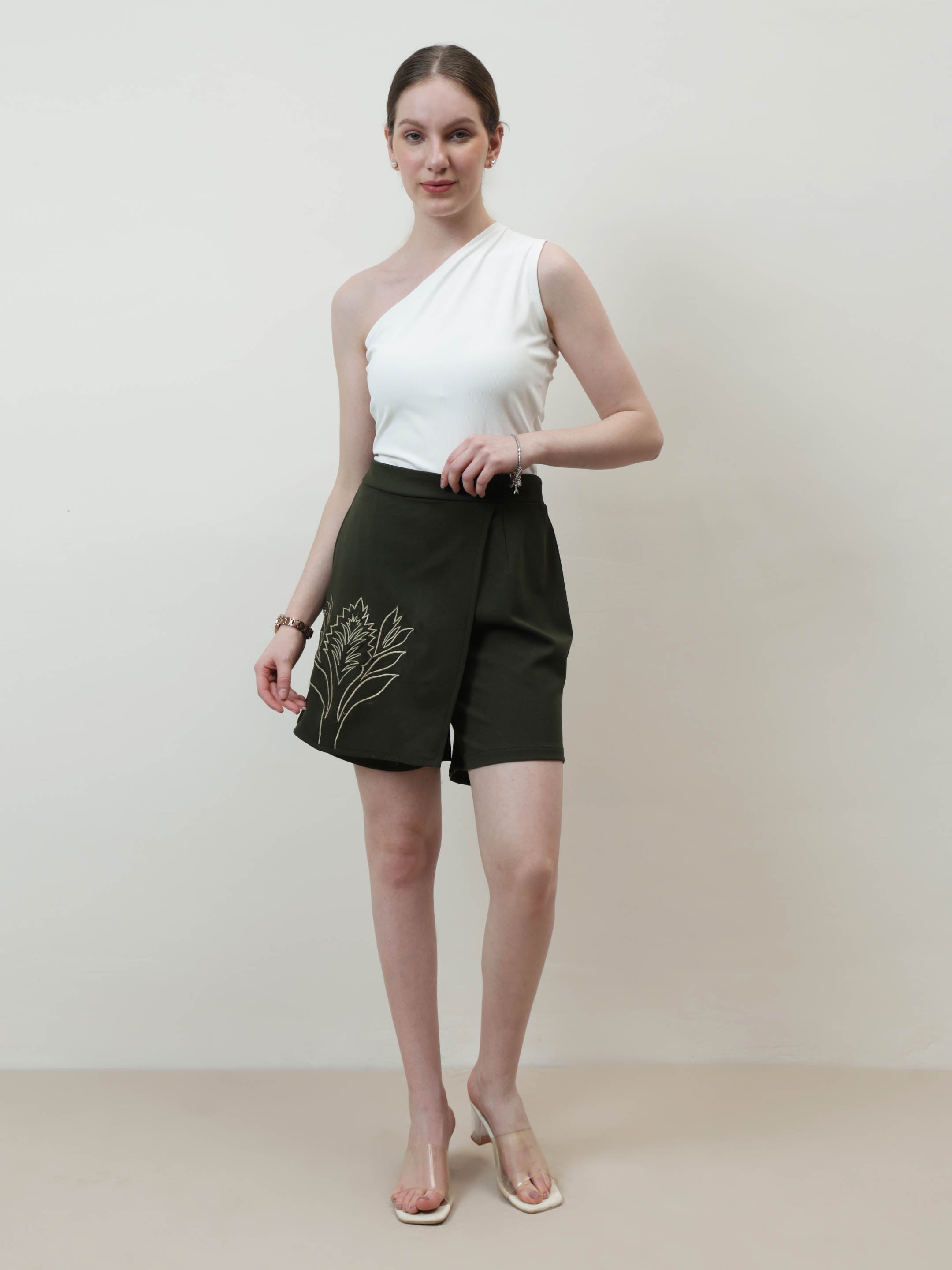 athena olive green solid mid rise regular shorts