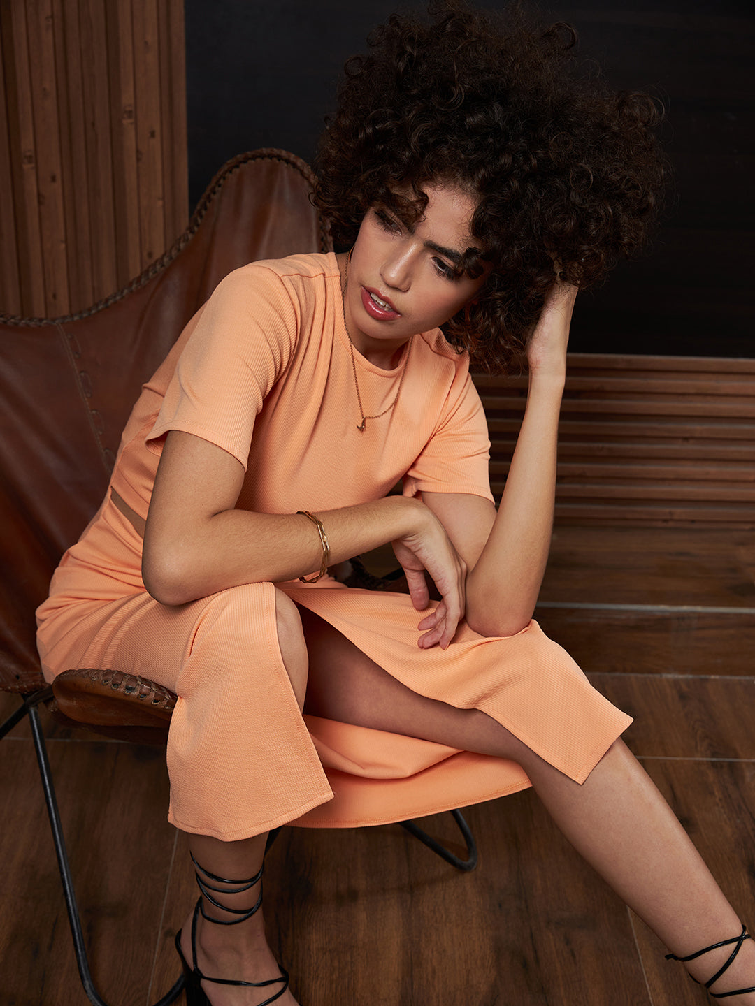 athena peach coloured round neck short sleeves cut outs sheath midi dress