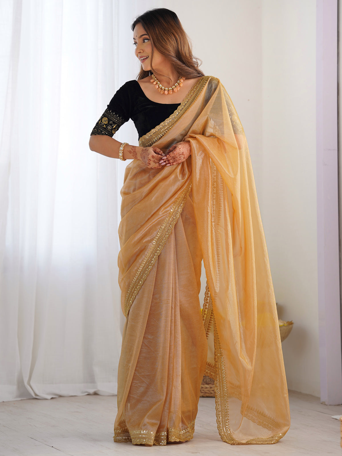 Women's Net Gold Embellished Designer Saree With Blouse Piece