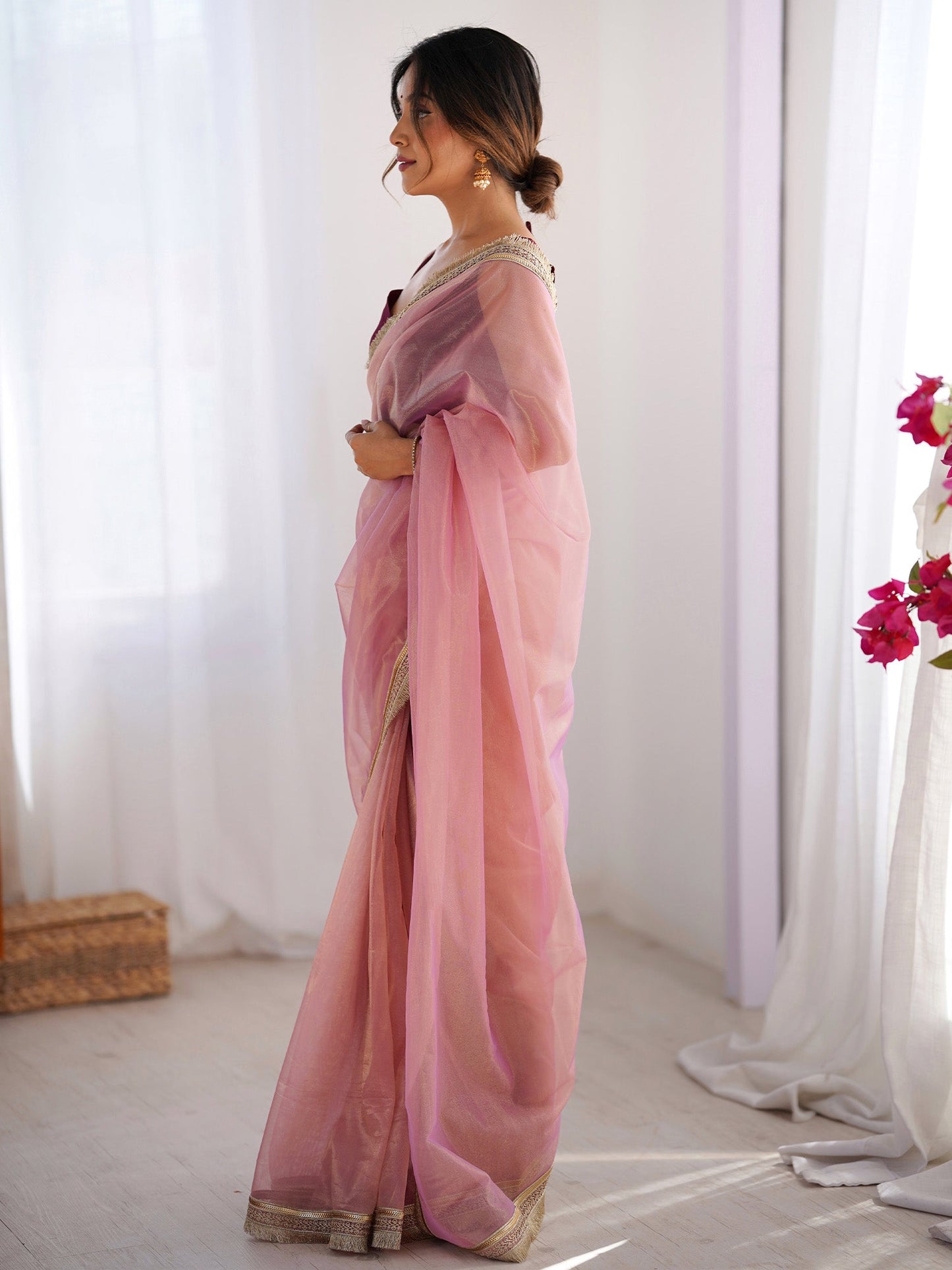 Women's Net Peach Embellished Designer Saree With Blouse Piece