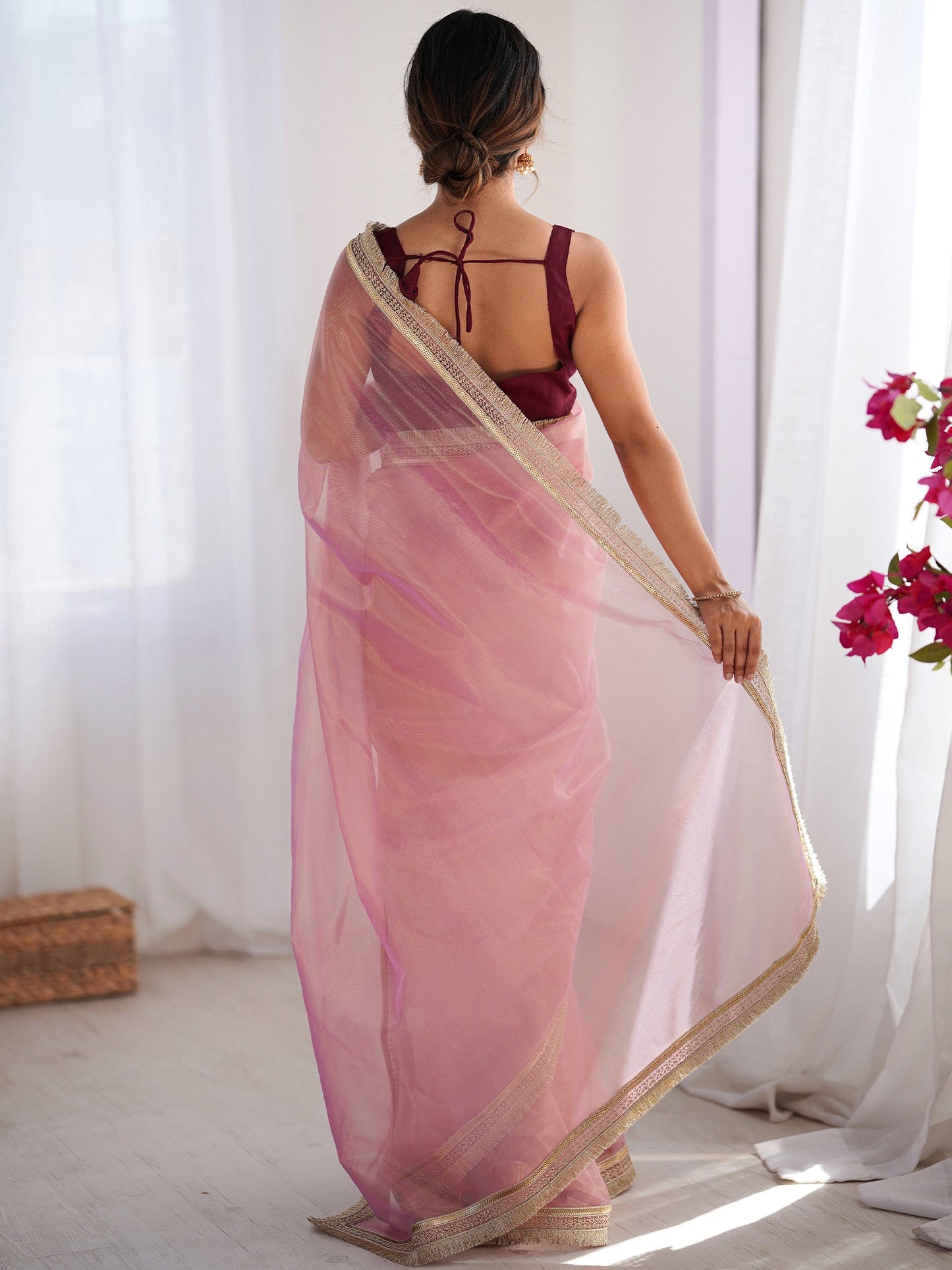 Women's Net Peach Embellished Designer Saree With Blouse Piece