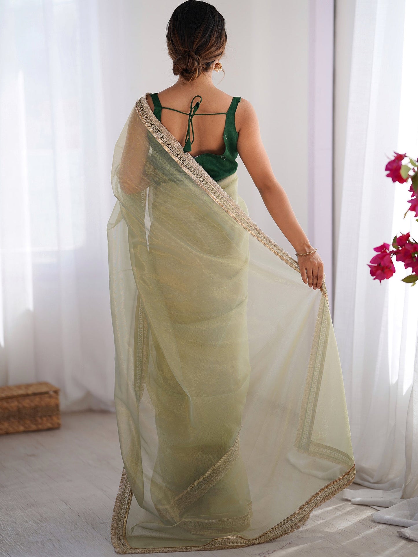 Women's Net Peach Embellished Designer Saree With Blouse Piece