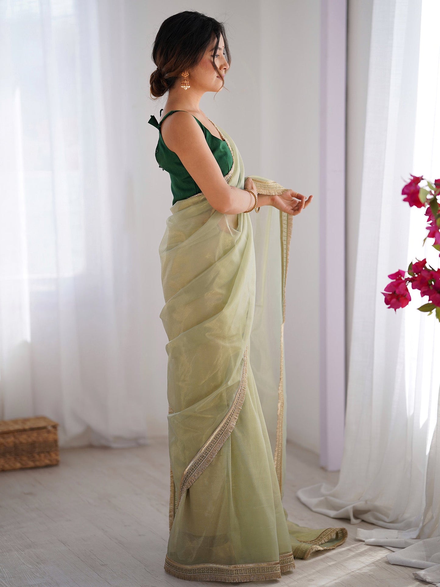 Women's Net Peach Embellished Designer Saree With Blouse Piece