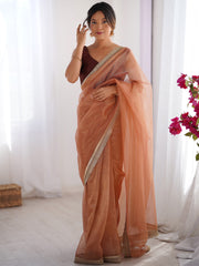Women's Net Peach Embellished Designer Saree With Blouse Piece