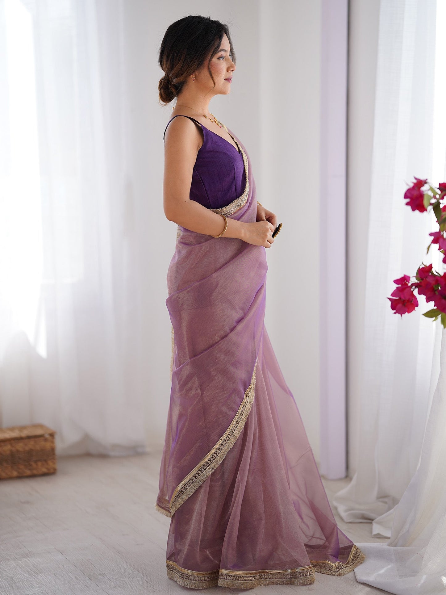 Women's Net Peach Embellished Designer Saree With Blouse Piece