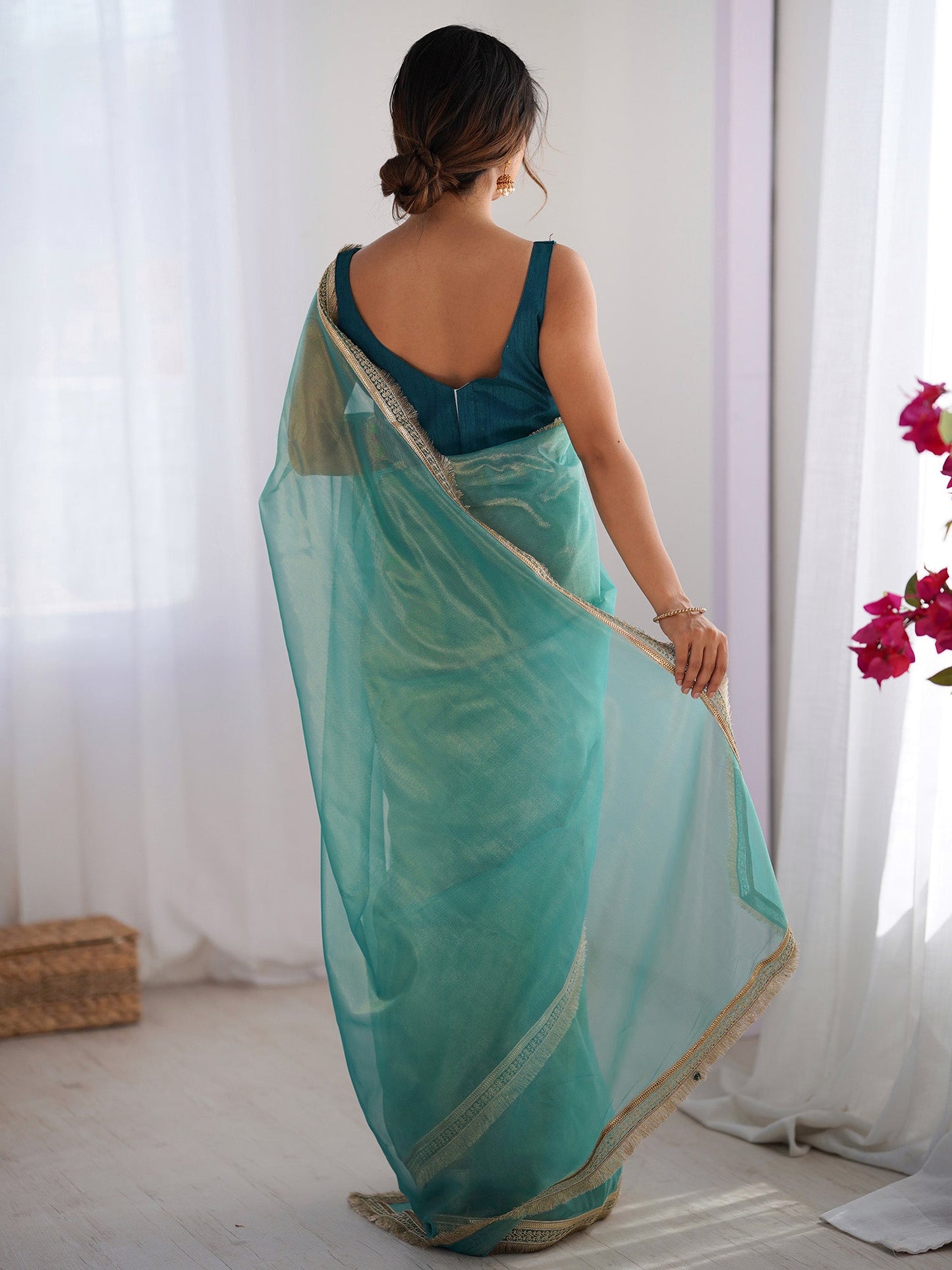 Women's Net Peach Embellished Designer Saree With Blouse Piece