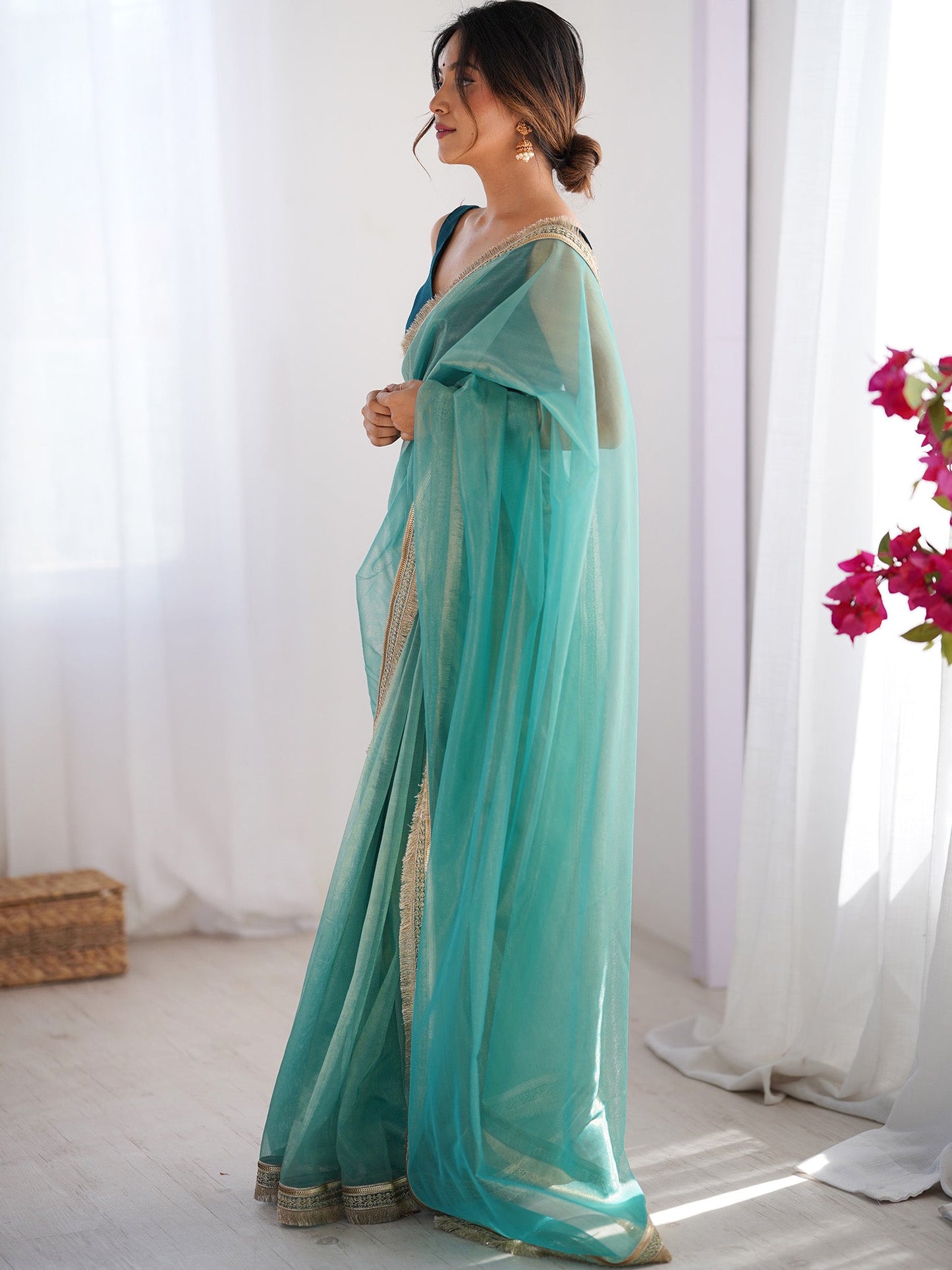Women's Net Peach Embellished Designer Saree With Blouse Piece
