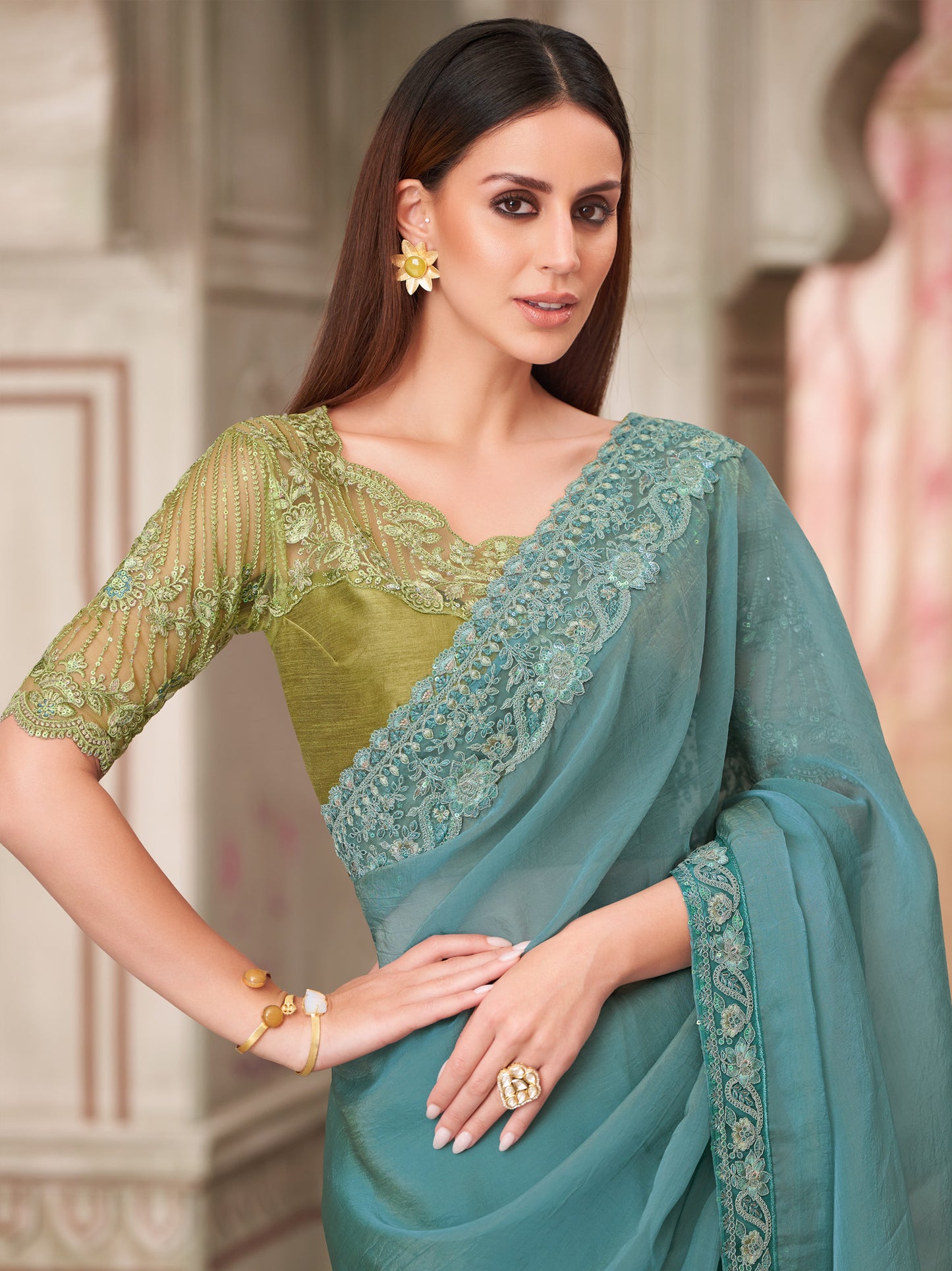 Women's Pure Georgette Turquoise Embellished Designer Saree With Blouse Piece