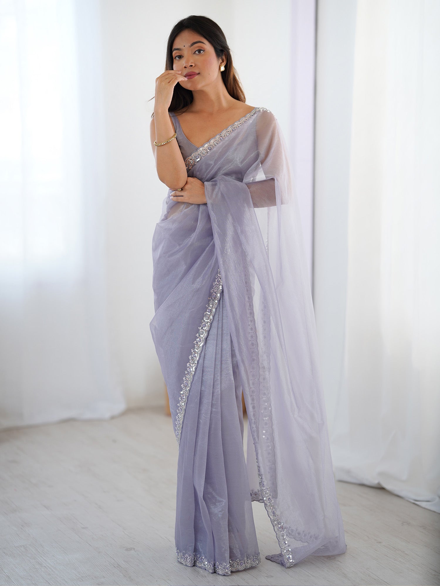Women's Net Lavendar Embellished Designer Saree With Blouse Piece