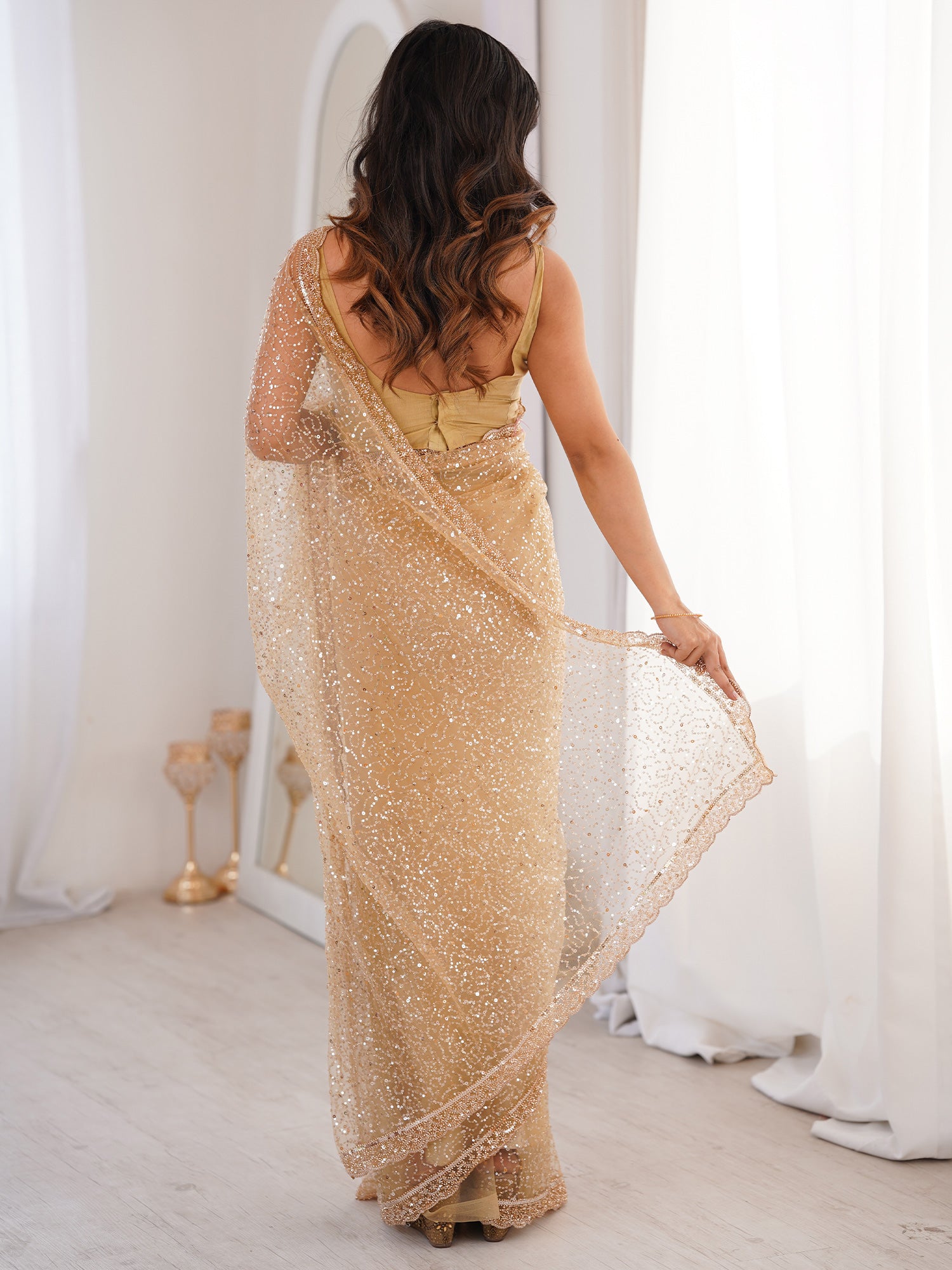 Women's Net Cream Embellished Designer Saree With Blouse Piece