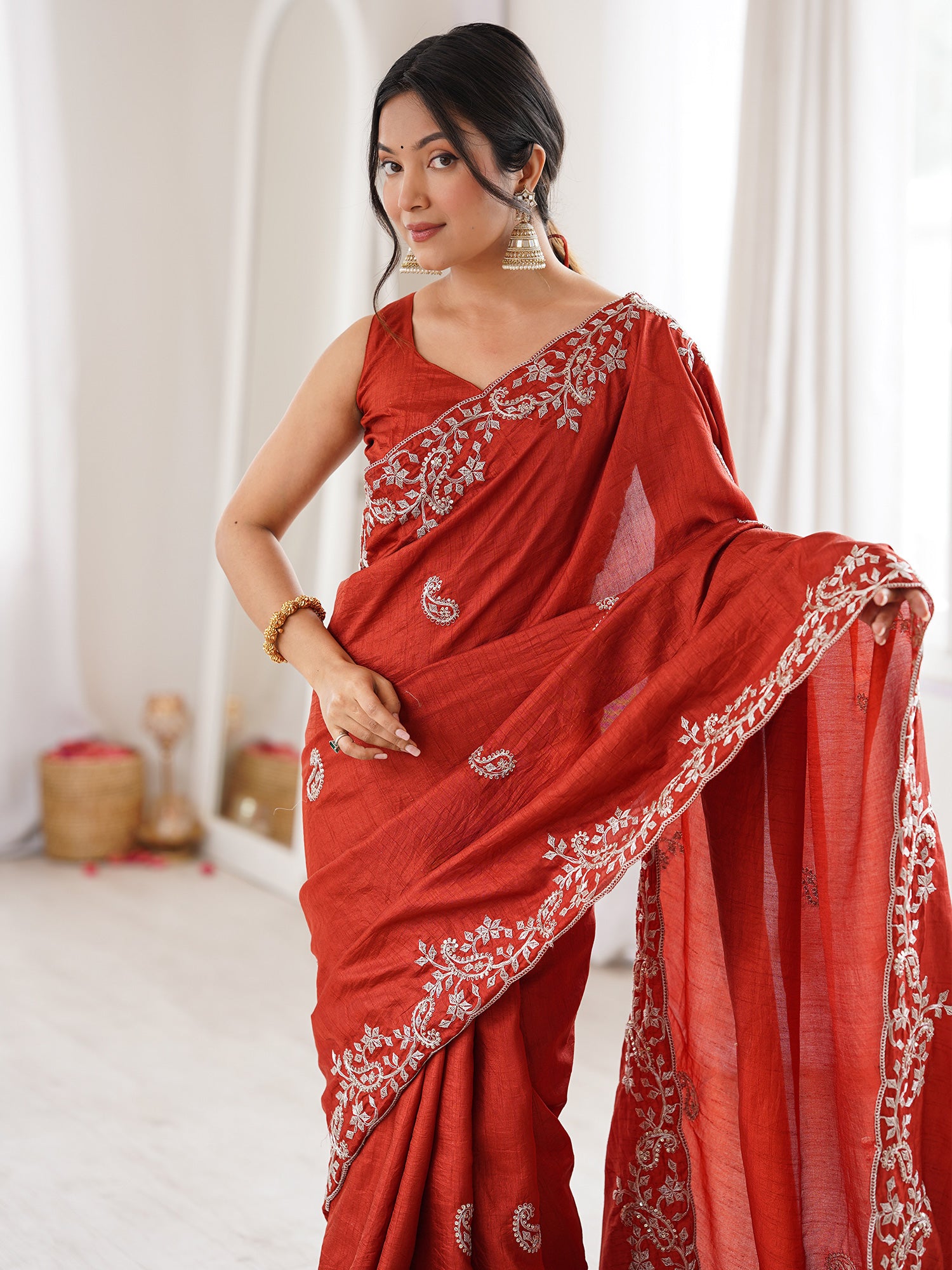 Women's Dola Silk Rust Embellished Designer Saree With Blouse Piece