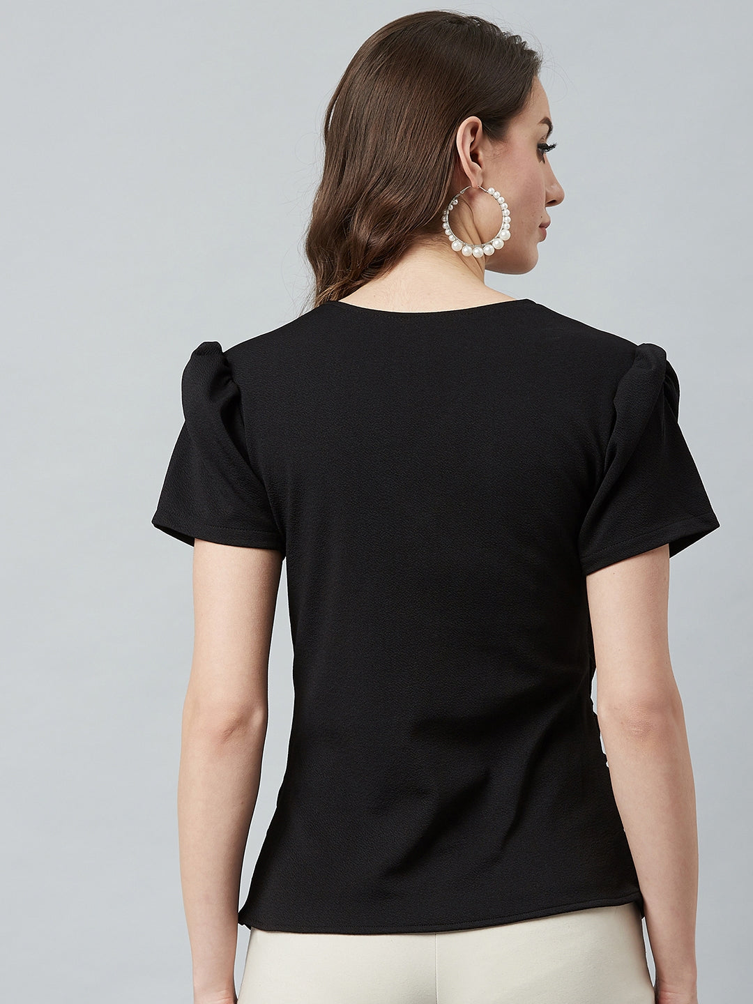 athena black wrap top with puffed sleeves