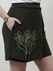 athena olive green solid mid rise regular shorts