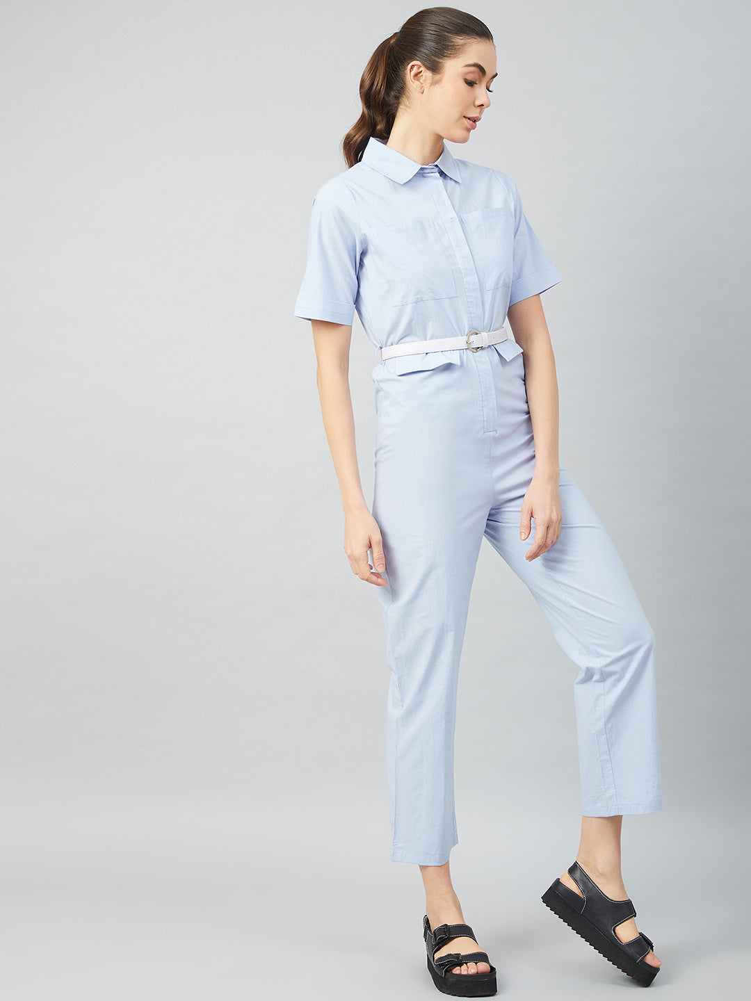 athena blue cotton jumpsuit front zip and pockets detail