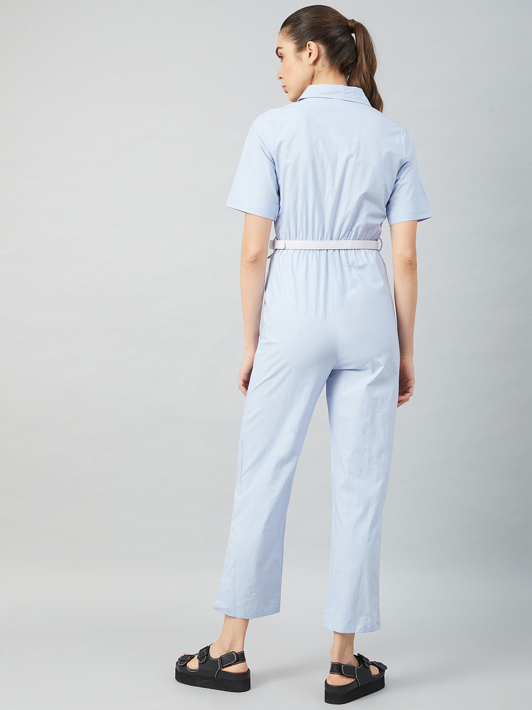 athena blue cotton jumpsuit front zip and pockets detail