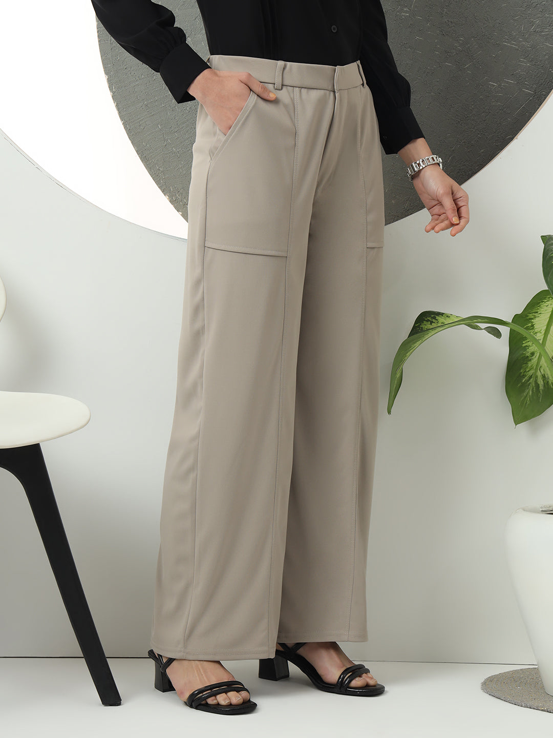 women solid designed high rise regular fit casual trousers 1