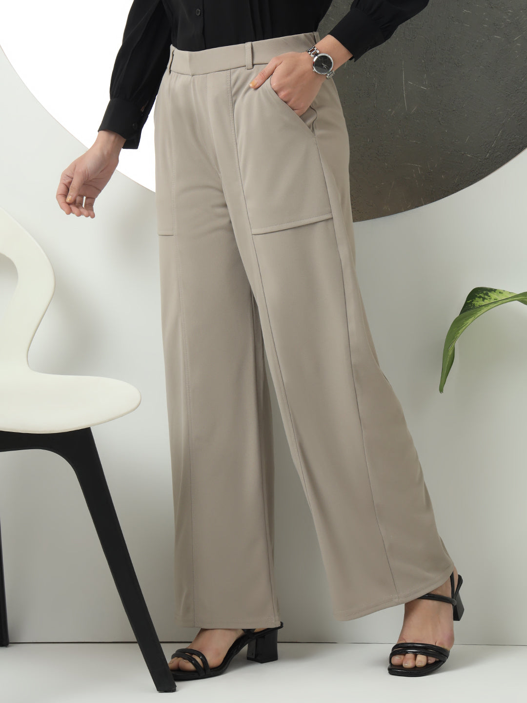women solid designed high rise regular fit casual trousers 1