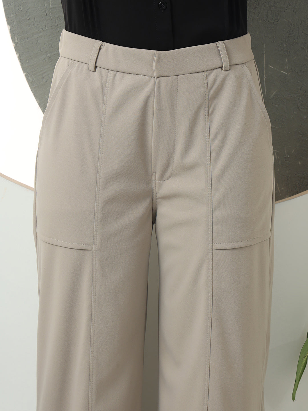 women solid designed high rise regular fit casual trousers 1