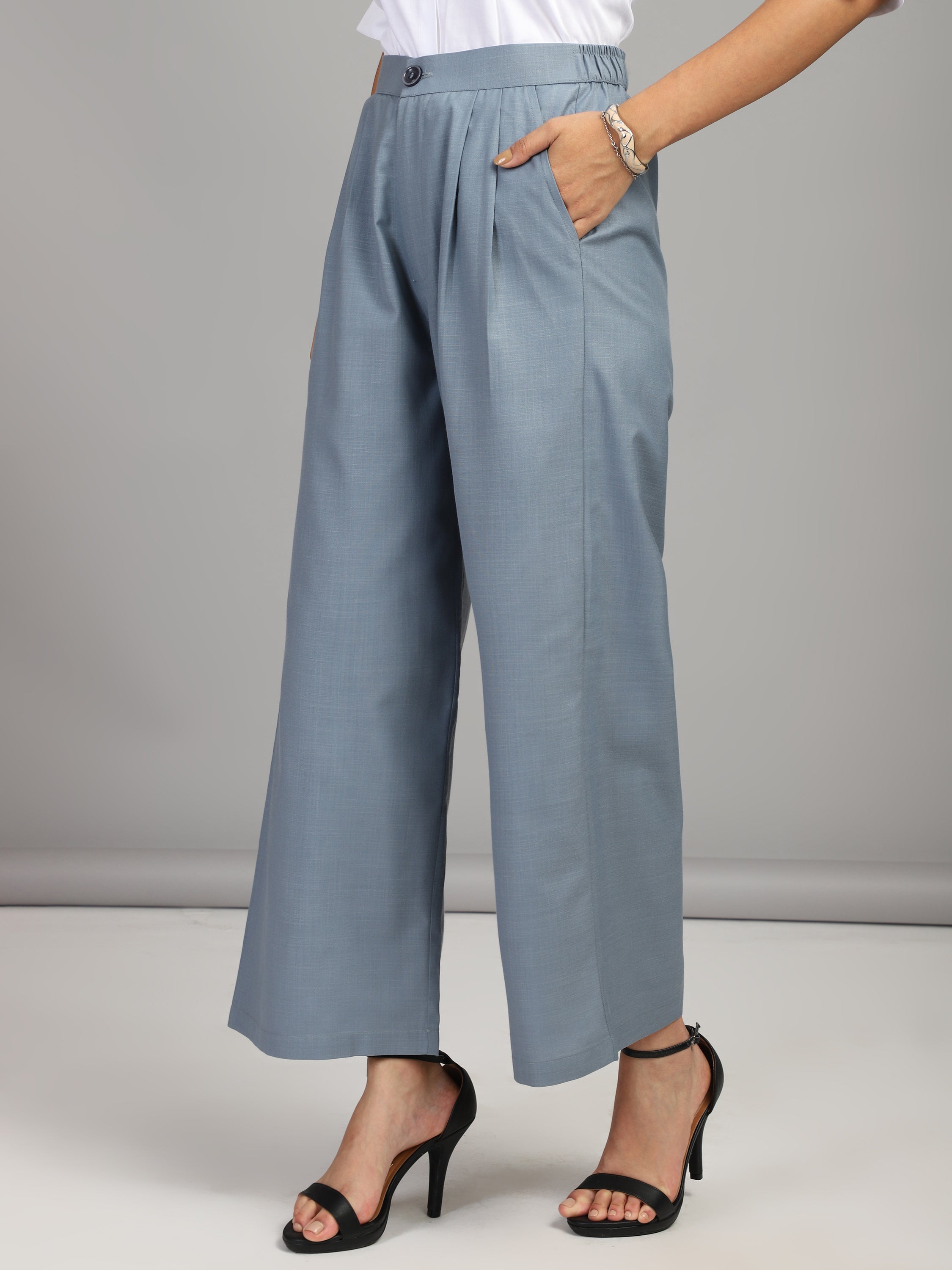 relaxed straight fit high rise pleated trousers