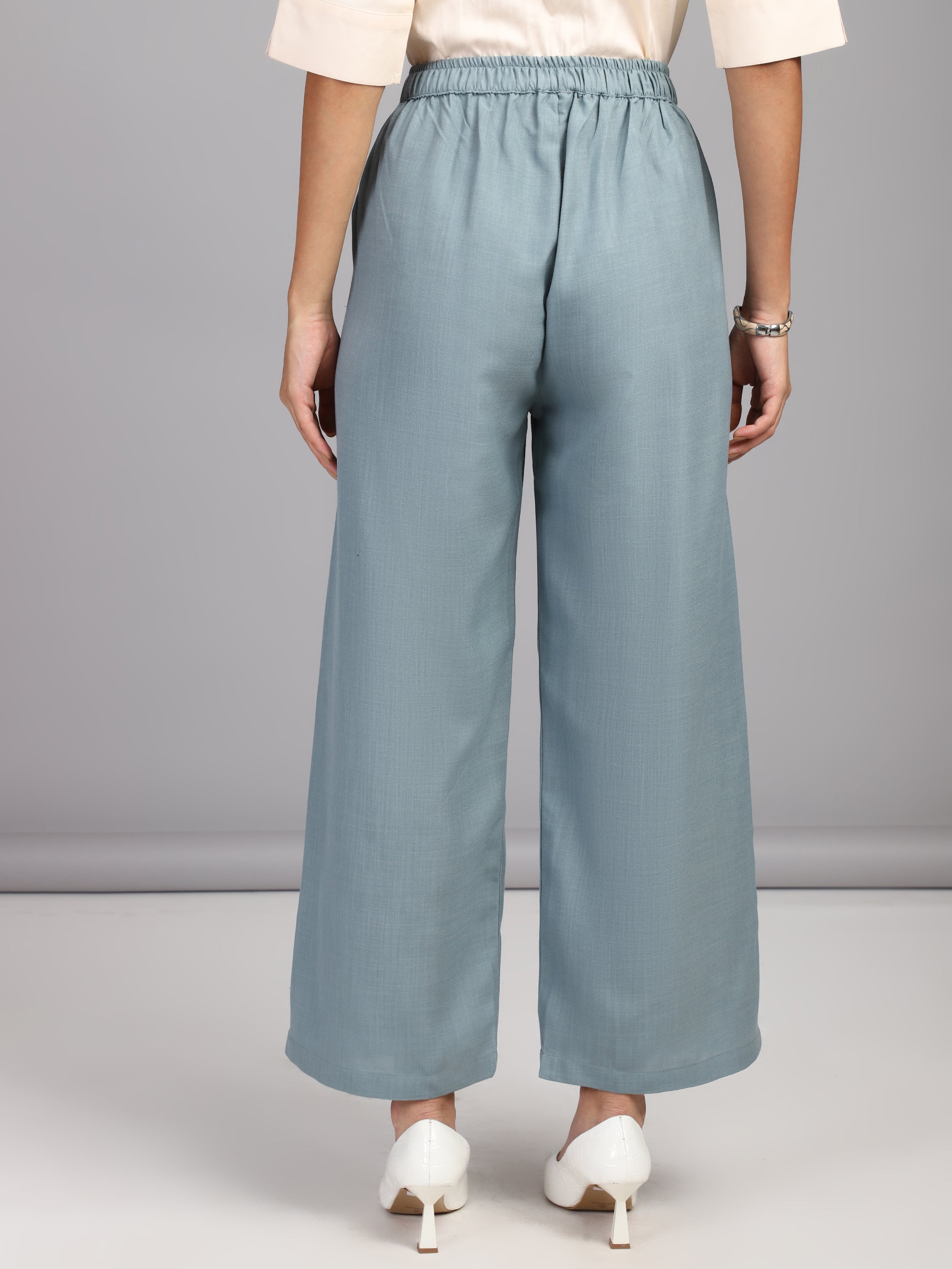 relaxed straight fit high rise pleated trousers