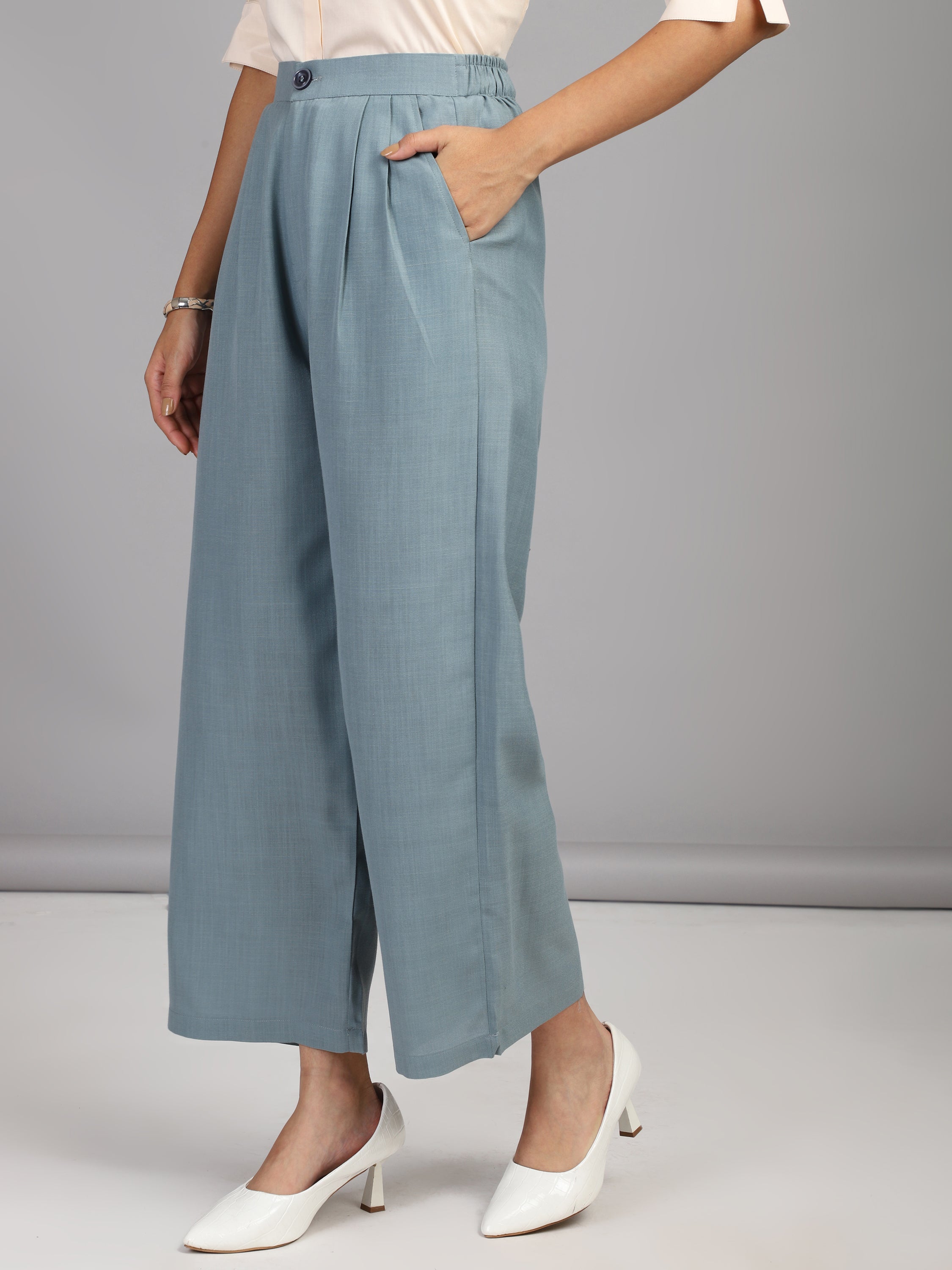 relaxed straight fit high rise pleated trousers